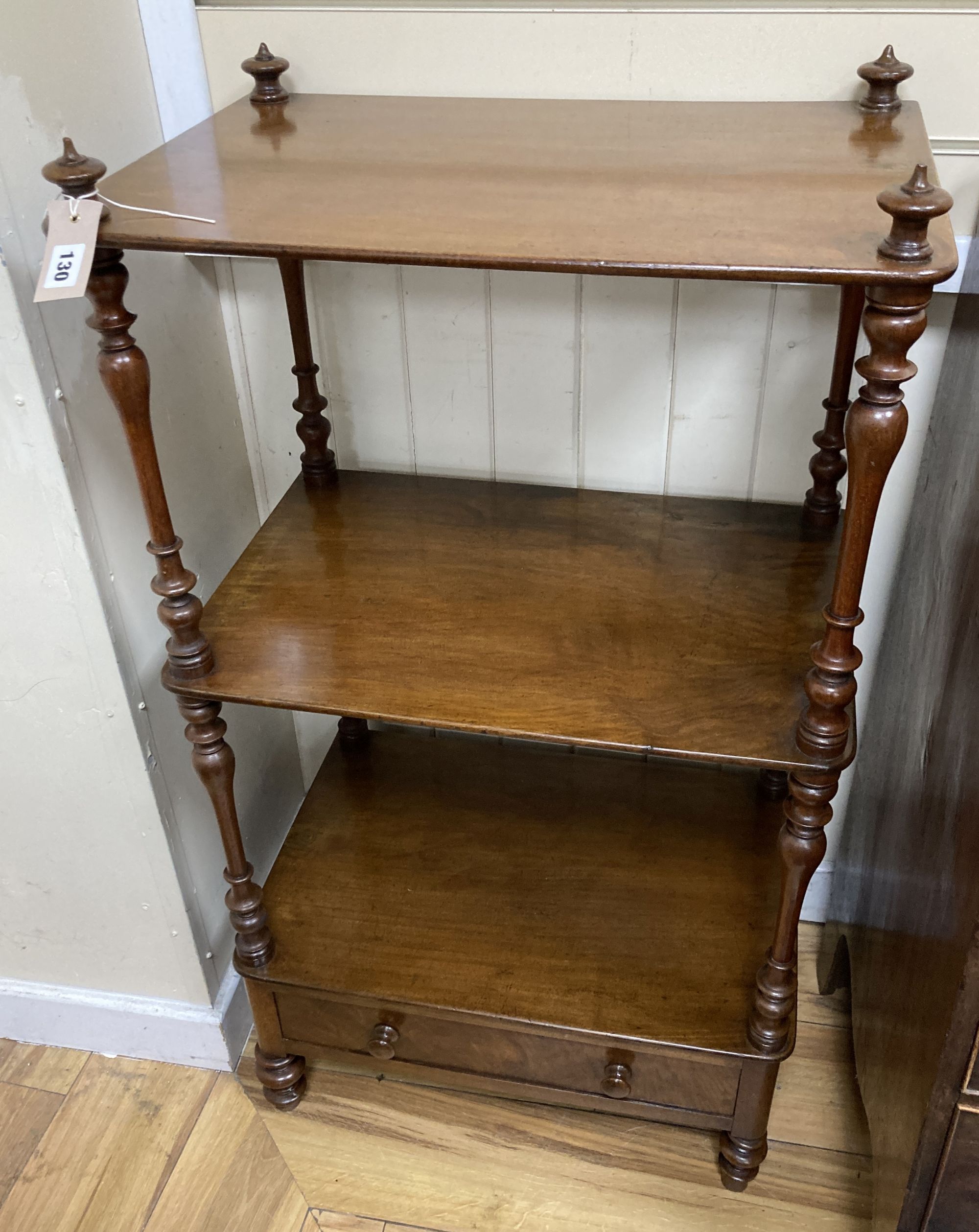 A Victorian mahogany three tiered whatnot with drawer, width 56cm, depth 37cm, height 104cm